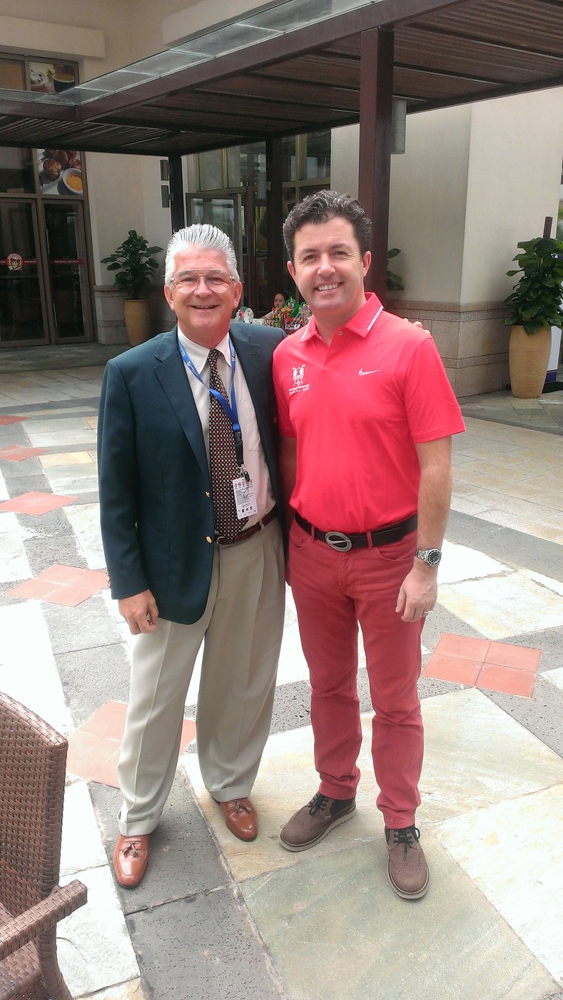 Brett Brasier with golf broadcaster and presenter Shane O'Donoghue at Mission Hills Golf Club, 28 October 2013